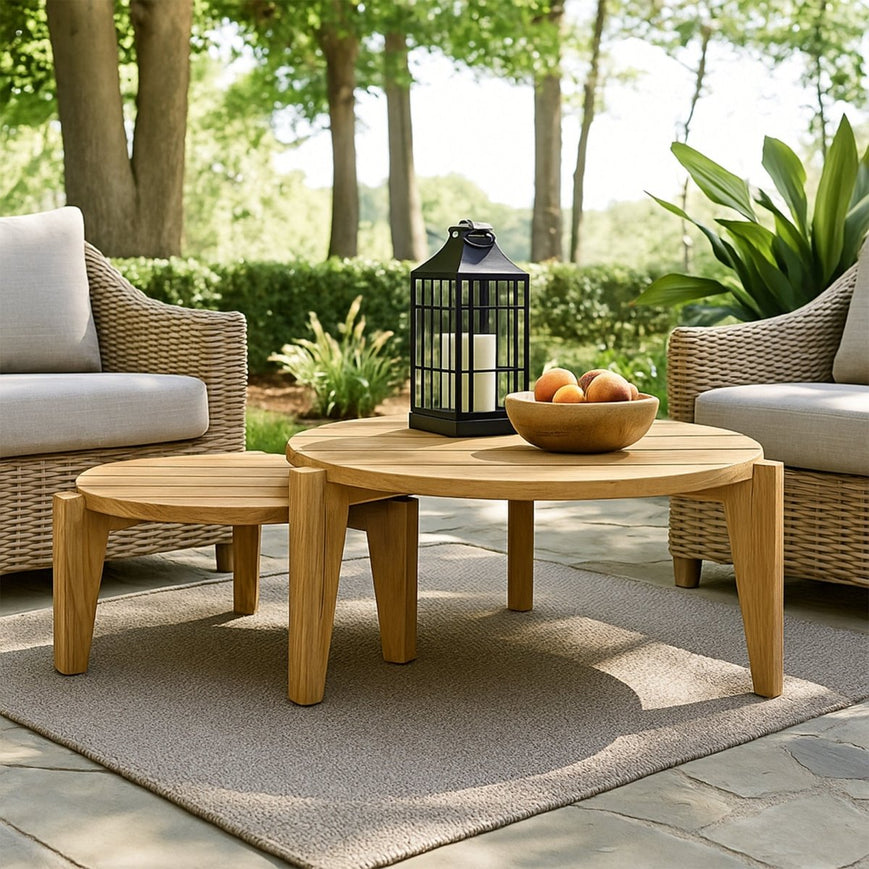 A teak outdoor coffee table on a nice patio
