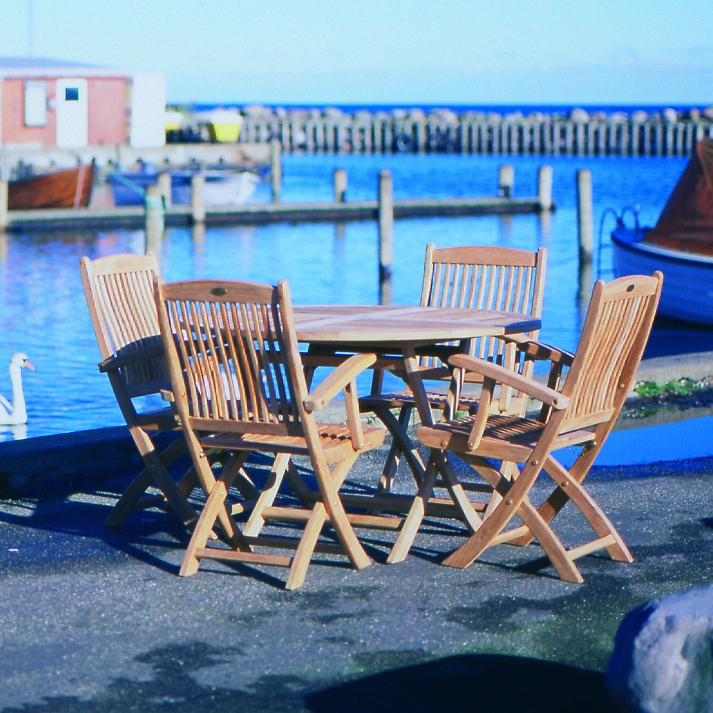 Royal Teak Sailor 47" Round Folding Table and 4 Sailor Arm Chairs